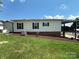 Ranch style home with large deck and landscaped yard at 231 Badin View Rd, New London, NC 28127