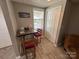 Basement breakfast bar with two stools and small table at 231 Badin View Rd, New London, NC 28127