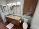 Bathroom boasting granite countertop and wooden cabinets at 231 Badin View Rd, New London, NC 28127