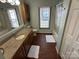 Clean bathroom with granite countertop, bathtub, and shower at 231 Badin View Rd, New London, NC 28127