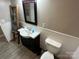 Bathroom with dark vanity, updated tile and fixtures at 231 Badin View Rd, New London, NC 28127