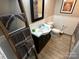 Clean bathroom with updated vanity, toilet, and tile flooring at 231 Badin View Rd, New London, NC 28127