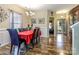 Bright dining room with hardwood floors and a view to entry at 127 Tranquil Ct # 18A, Locust, NC 28097