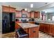 Spacious kitchen featuring an island, ample cabinetry, and modern appliances at 127 Tranquil Ct # 18A, Locust, NC 28097