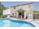 Relaxing kidney-shaped pool with adjacent patio and bar area at 127 Tranquil Ct # 18A, Locust, NC 28097