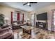 Living room with brown leather sofas and a fireplace at 127 Tranquil Ct # 18A, Locust, NC 28097