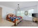 Main bedroom with a king bed and large windows at 127 Tranquil Ct # 18A, Locust, NC 28097