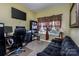 Home office with a desk, computer, and comfortable couch at 127 Tranquil Ct # 18A, Locust, NC 28097