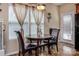 Charming breakfast nook with a round table and access to the backyard at 127 Tranquil Ct # 18A, Locust, NC 28097