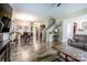 Open concept living area with hardwood floors and stairs at 127 Tranquil Ct # 18A, Locust, NC 28097