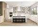 Spacious kitchen with white cabinets, large island, and stainless steel appliances at 337 Tradition Dr, Mount Gilead, NC 27306