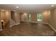 Spacious living room with hardwood floors and neutral walls at 310 Chaney St, Wingate, NC 28174