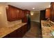 Renovated kitchen with granite counters and stainless steel appliances at 310 Chaney St, Wingate, NC 28174