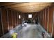 Unfinished basement with exposed beams and concrete floor at 310 Chaney St, Wingate, NC 28174