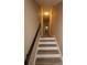 Long hallway with hardwood floors and neutral walls at 310 Chaney St, Wingate, NC 28174