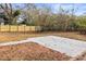 Large backyard with a new wooden fence and a concrete pad at 57 Pickney St, York, SC 29745