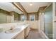 Bathroom with double vanity and shower/tub at 1418 Oakwood Ave, Kannapolis, NC 28081