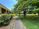 Concrete walkway leading to the house's entrance at 506 Hearne Farm Rd, Mount Gilead, NC 27306
