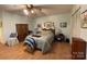 Main bedroom with hardwood floors and built-in wardrobe at 506 Hearne Farm Rd, Mount Gilead, NC 27306