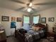 Spacious bedroom with a double bed and ceiling fan at 506 Hearne Farm Rd, Mount Gilead, NC 27306