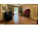 Gathering room with built-in shelving and backyard access at 506 Hearne Farm Rd, Mount Gilead, NC 27306