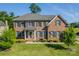 Two-story brick home with a lush green lawn at 2073 Hambridge Ave, Kannapolis, NC 28081
