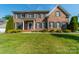Two story brick house with landscaping at 2073 Hambridge Ave, Kannapolis, NC 28081