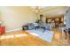 Gathering room with hardwood floors and a cozy sectional sofa at 2073 Hambridge Ave, Kannapolis, NC 28081