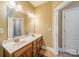 Double vanity bathroom with wood cabinets at 2073 Hambridge Ave, Kannapolis, NC 28081