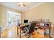 Home office with built-in desk and French doors opening to the Gathering room at 2073 Hambridge Ave, Kannapolis, NC 28081