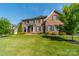 Two-story brick home with a lush green lawn at 2073 Hambridge Ave, Kannapolis, NC 28081