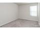 Bright bedroom with neutral walls and carpet at 3820 Shider Ln, Kannapolis, NC 28081