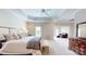 Bright main bedroom with sitting area and ensuite bathroom at 204 Knoxview Ln, Mooresville, NC 28117