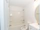 Simple bathroom with tub, toilet and vanity at 7340 Pebblestone Dr # C, Charlotte, NC 28212