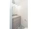 Modern bathroom with granite countertop and patterned floor at 7340 Pebblestone Dr # C, Charlotte, NC 28212