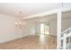 Dining room with hardwood floors and sliding glass doors at 7340 Pebblestone Dr # C, Charlotte, NC 28212