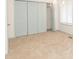Spacious bedroom with light blue closet doors and carpeting at 7340 Pebblestone Dr # C, Charlotte, NC 28212