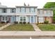 Townhouse with light gray siding and blue front door at 7340 Pebblestone Dr # C, Charlotte, NC 28212