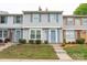 Townhouse with light gray siding and blue front door at 7340 Pebblestone Dr # C, Charlotte, NC 28212