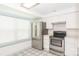 Kitchen with stainless steel appliances and light cabinets at 7340 Pebblestone Dr # C, Charlotte, NC 28212