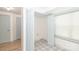 Laundry closet with light blue doors and patterned tile floor at 7340 Pebblestone Dr # C, Charlotte, NC 28212