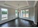 Formal dining room with wainscoting, chandelier, and hardwood floors at 12115 Sessile Dr # Oak0021, Mint Hill, NC 28227