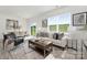 Living room features a comfy sofa, coffee table, and natural light at 219 Brinkley Dr, Kings Mountain, NC 28086