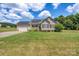 Ranch-style home with solar panels and a spacious yard at 1000 Creekside Dr, Lincolnton, NC 28092