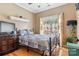 Cozy bedroom with a double bed, decorative accents, and plenty of closet space at 1000 Creekside Dr, Lincolnton, NC 28092