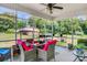 Relaxing screened porch overlooking backyard and deck at 1000 Creekside Dr, Lincolnton, NC 28092