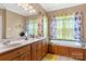 Elegant bathroom with double sinks, garden tub, and updated fixtures at 1000 Creekside Dr, Lincolnton, NC 28092
