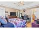Well-appointed bedroom with a queen-size bed, workspace, and views of the backyard at 1000 Creekside Dr, Lincolnton, NC 28092