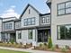 Modern two-story home with gray siding and a front porch at 135 Armstrong Rd, Belmont, NC 28012
