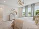 Spacious main bedroom with a dresser and large windows at 135 Armstrong Rd, Belmont, NC 28012